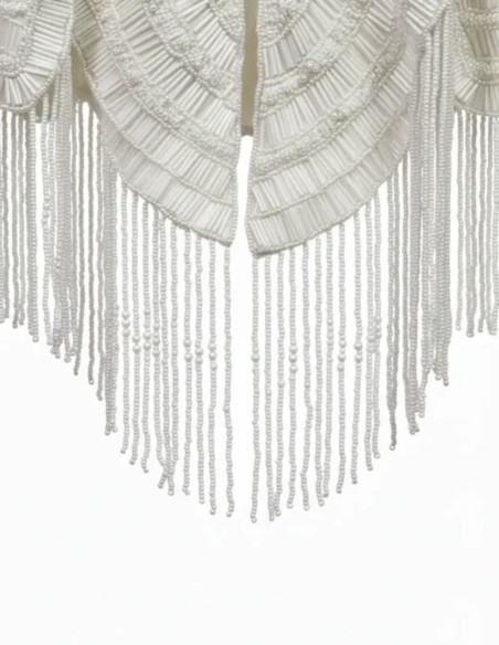 Bridal cape with beaded embroidery in delicate lines