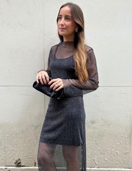 Long dress with shiny fabric and transparencies