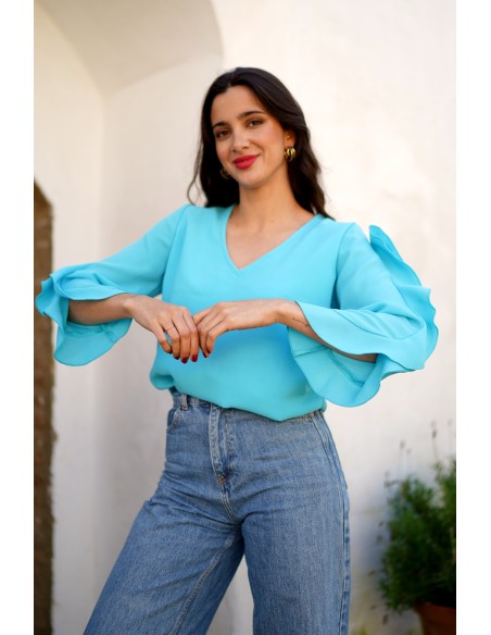 Aquamarine blouse with neckline slit and ruffle sleeves
