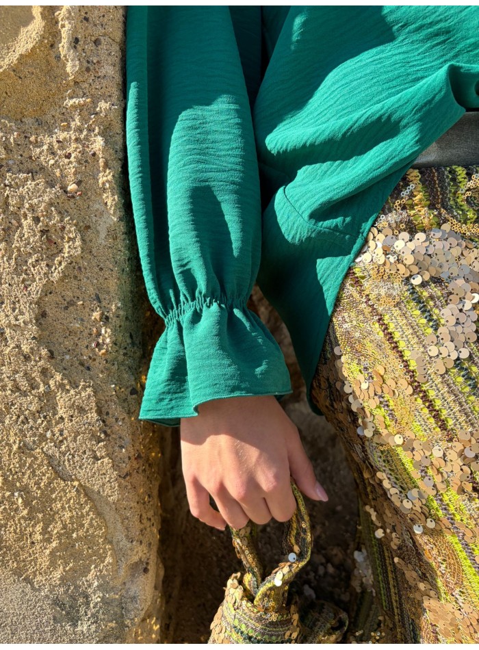 Green blouse with ruffles and long ruffled sleeves