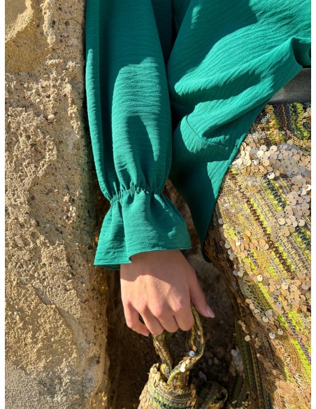 Green blouse with ruffles and long ruffled sleeves