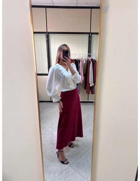 Raw blouse with ruffles and long sleeves