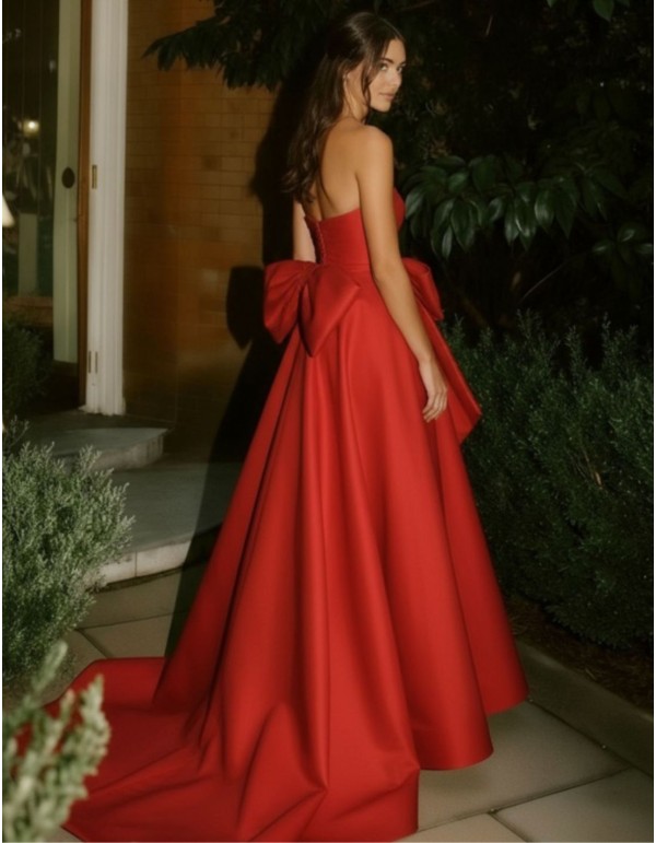 Long dress with strapless neckline and maxi-lapel for a...