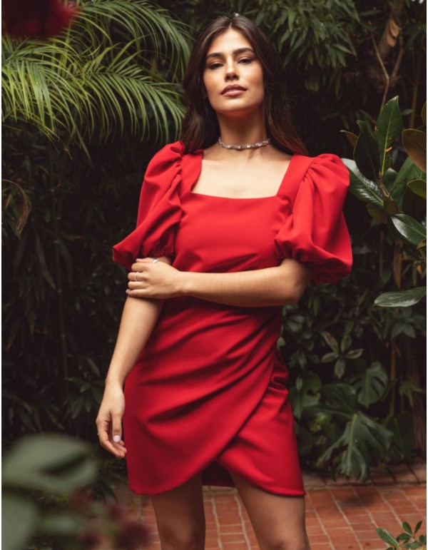 Short red dress with square neckline and draped skirt