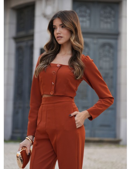 Pantalon taille haute en terracotta avec poches latérales et élégante fermeture éclair invisible