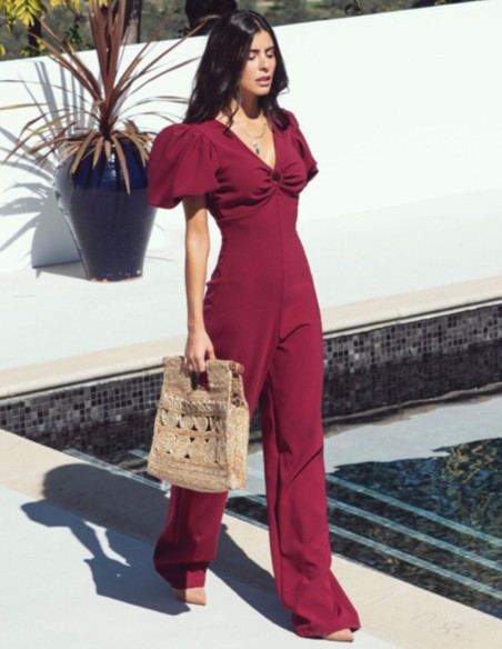 Burgundy jumpsuit with puffed sleeves and knotted back