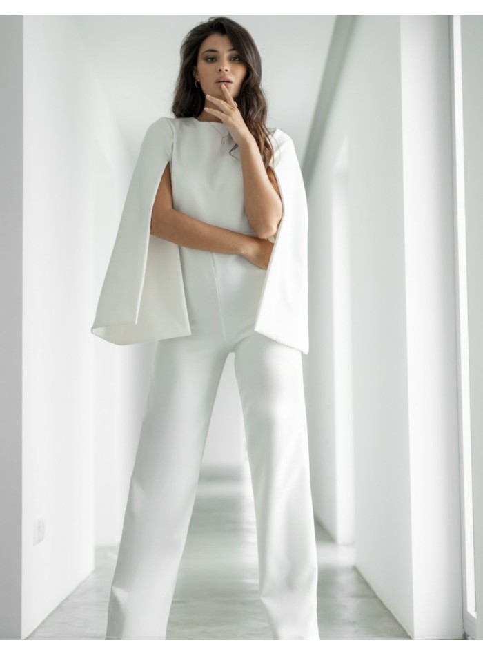 White jumpsuit with puffed sleeves and open back
