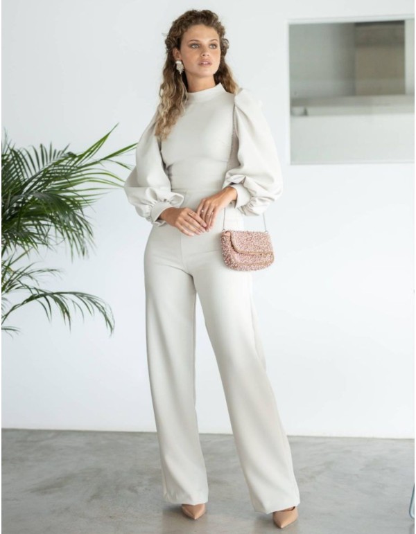 Beige jumpsuit with high collar and long puffed sleeves