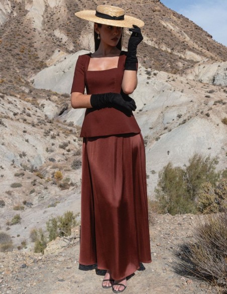 Brown two-piece set with satin top and flared skirt