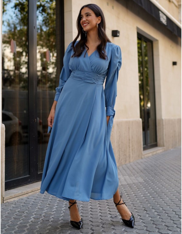 Light blue midi dress with V-neckline and flowing skirt