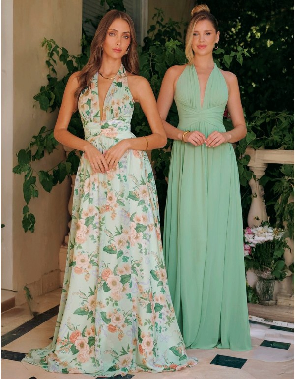 Long wedding guest dress with halter neckline and floral...
