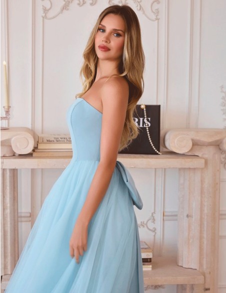 Long strapless guest dress with tulle skirt and bow detail