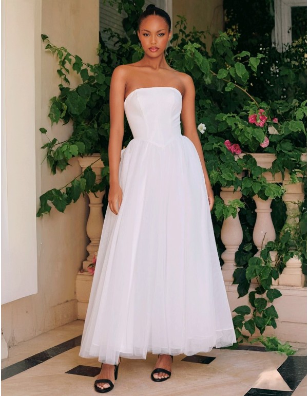 Strapless long wedding dress with tulle skirt and bow detail