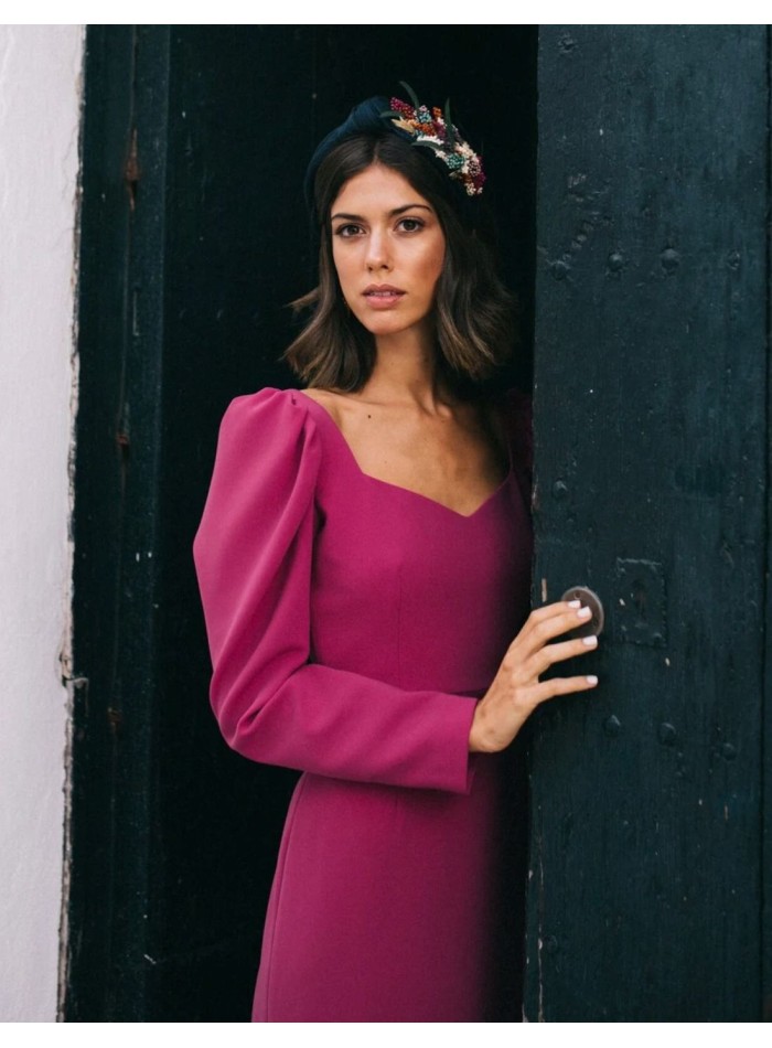 Diadema azul marino con adorno floral en lateral