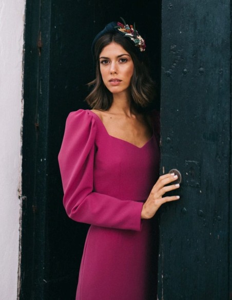 Navy blue headband with floral ornament on the side