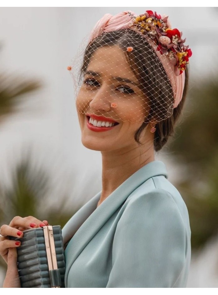 Ruffled party headband with knots and floral...