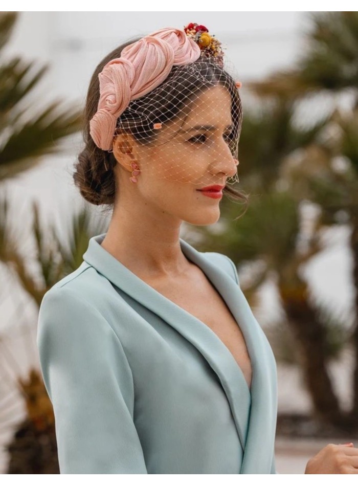 Ruffled party headband with knots and floral...