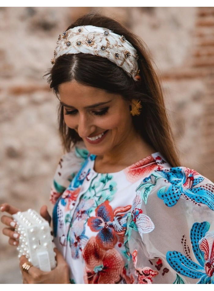 Bandeau d'invité en plumes blanches avec...