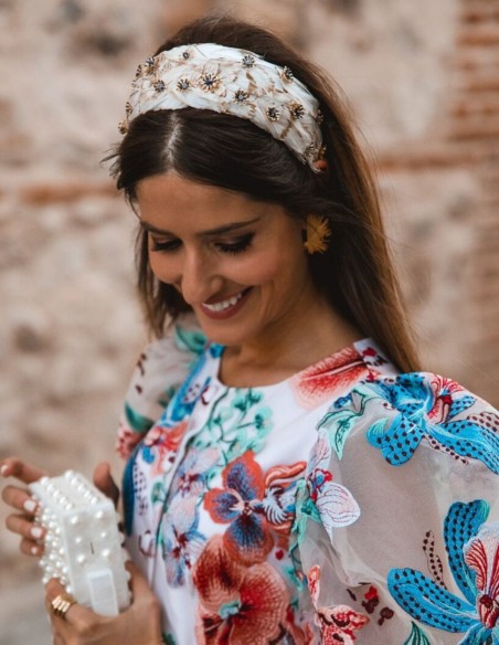 White feather guest headband with jeweled decoration