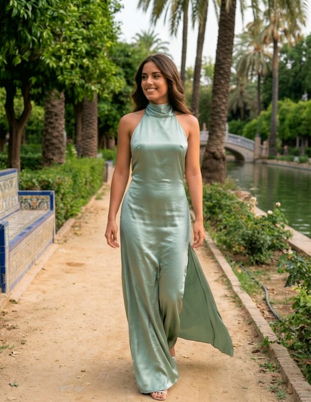 Pastel green satin graduation dress with halter neckline and open back