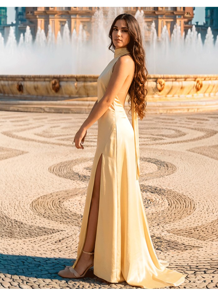 Pastel yellow satin prom dress with halter...