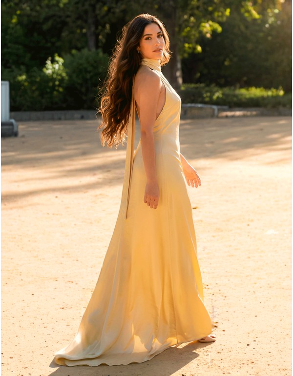 Pastel yellow satin prom dress with halter neckline and... 2