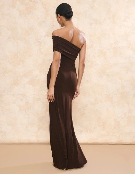 Long party dress in silk knit with asymmetrical neckline
