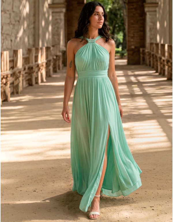 Pastel green long party dress with halter neckline, rhinestones and opening