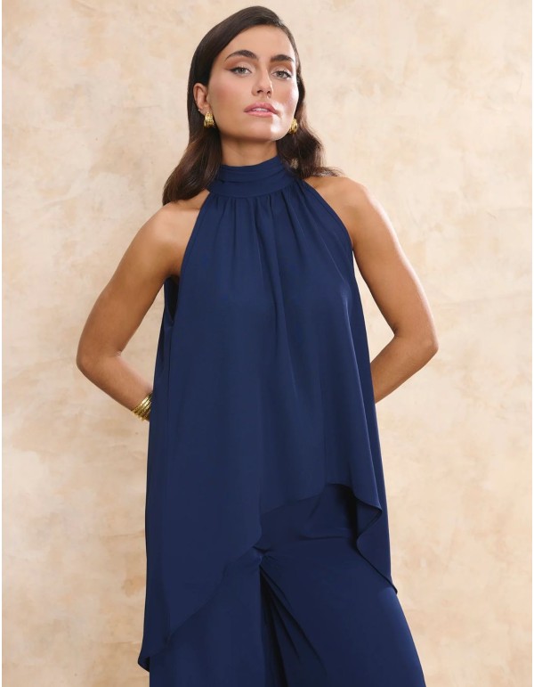 Top de invitada multiposición azul marino con cuello halter y caída vaporosa