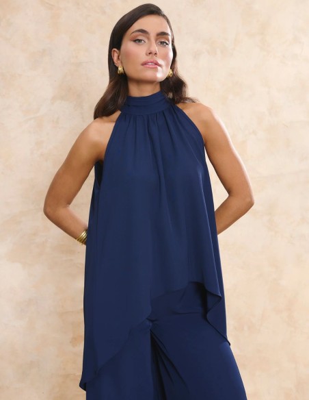 Multi-position navy blue halter-neck halter top with flowing drape