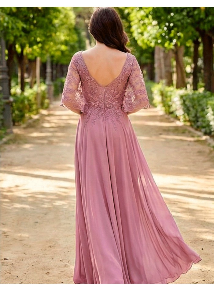 Long godmother dress with lace cape bodice and...