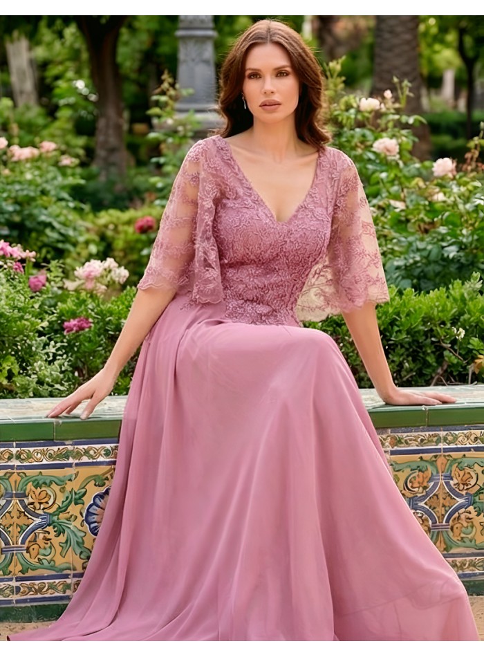 Long godmother dress with lace cape bodice and...