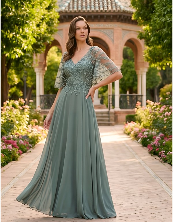 Light green long godmother dress with cape lace bodice