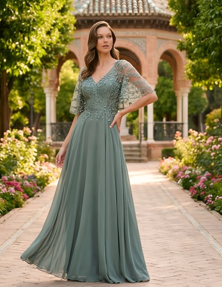 Light green long godmother dress with cape lace bodice