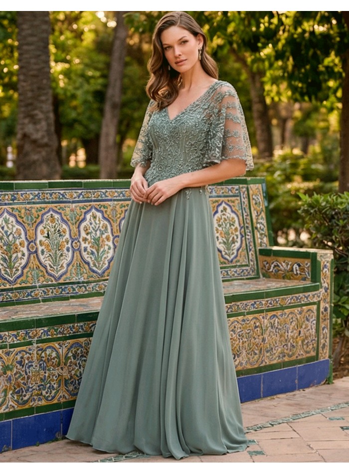 Longue robe de marraine vert clair avec corsage...