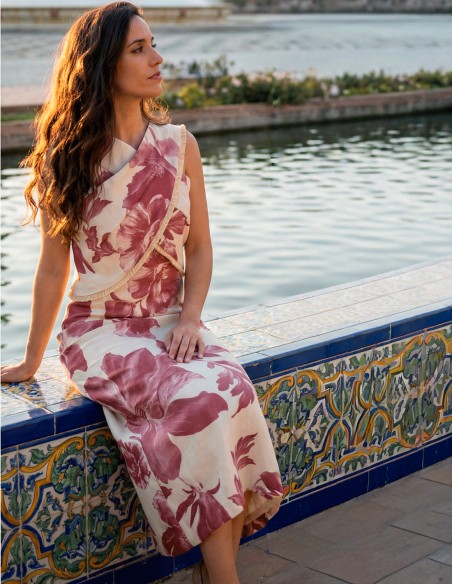 Pink and white printed midi dress with halter neckline for guests