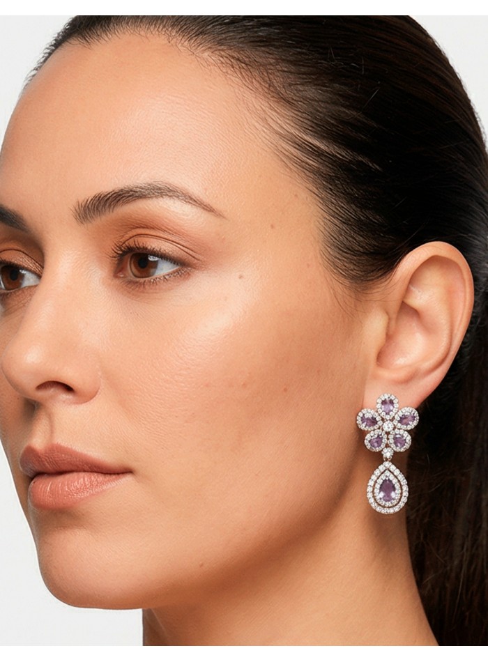 Boucles d'oreilles composées de fleurs et de...