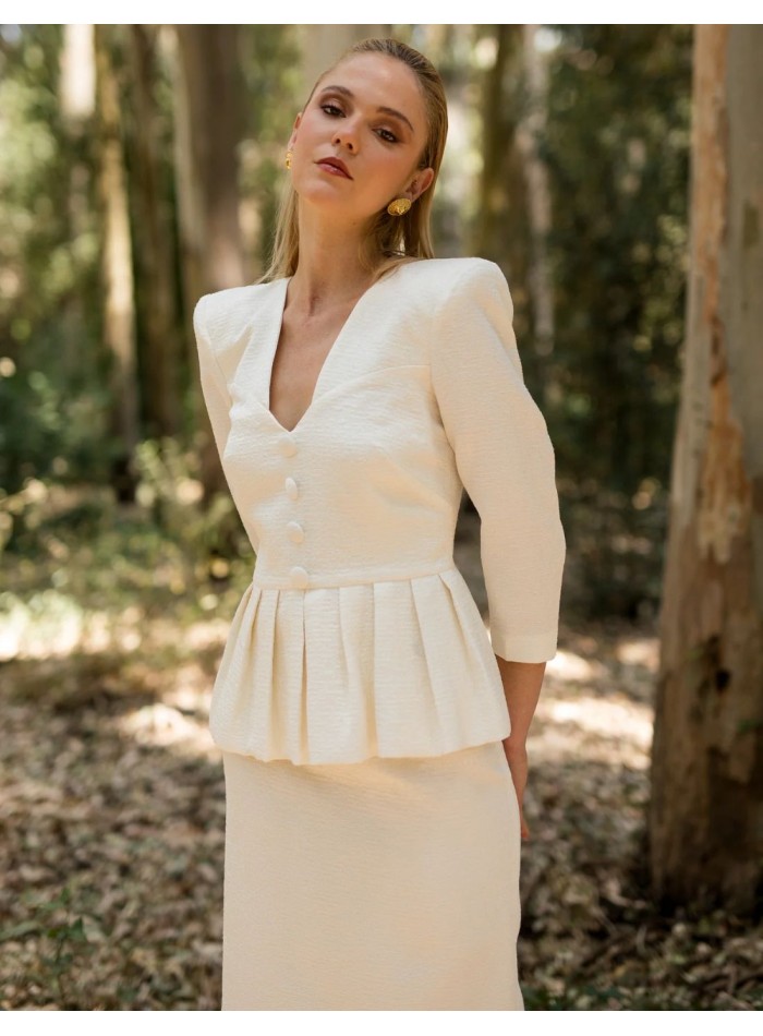 Conjunto dos piezas en tejido jacquard con hombreras marcadas