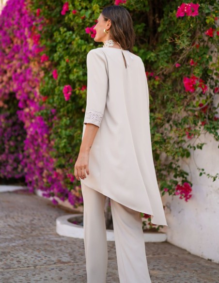 Ivory two-piece set with asymmetrical blouse