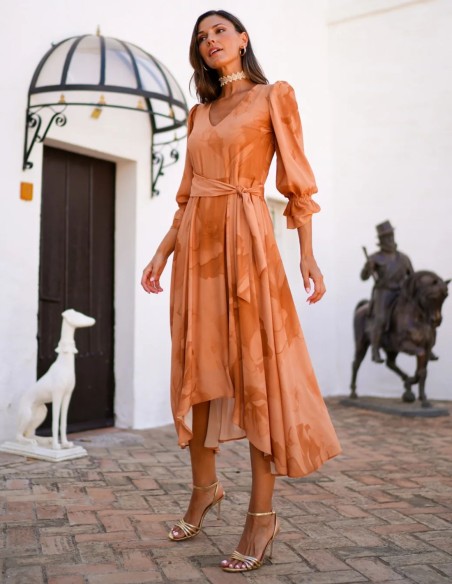 Fluid orange printed midi guest dress with side bow and side tie