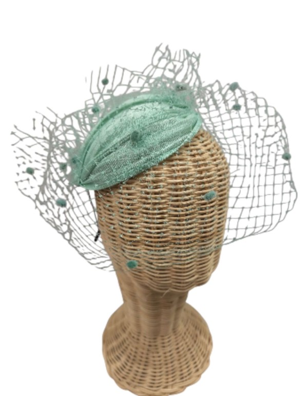 Water green guest headdress with lattice veil