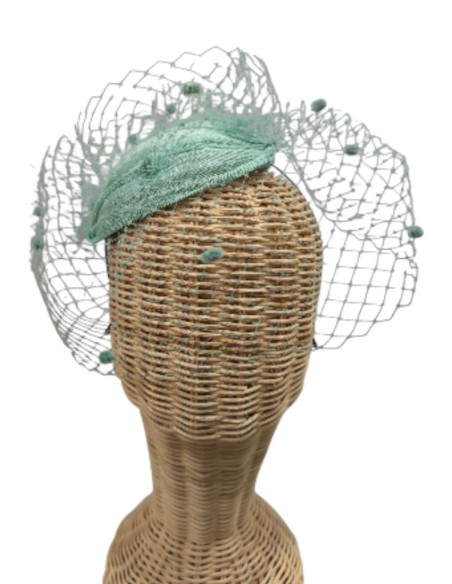 Water green guest headdress with lattice veil