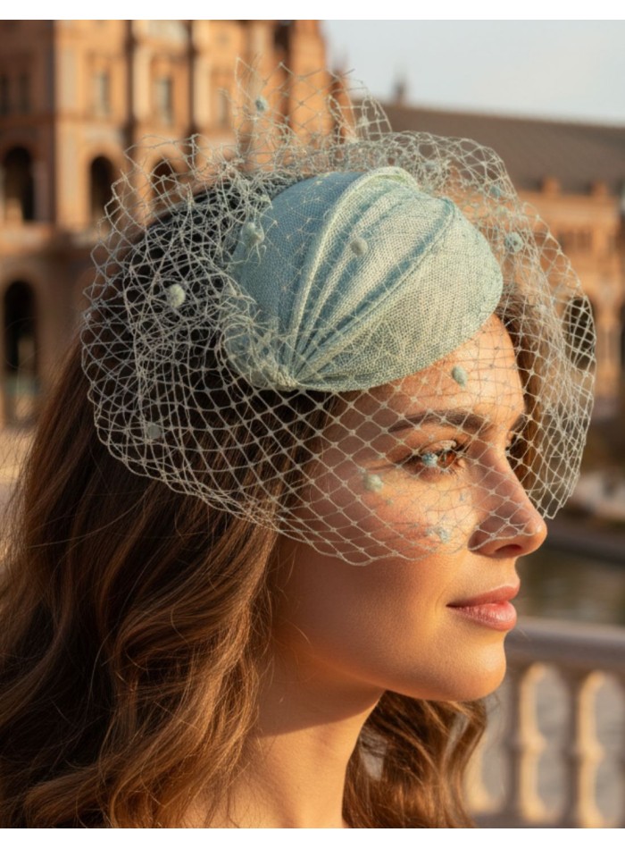 Water green guest headdress with lattice veil