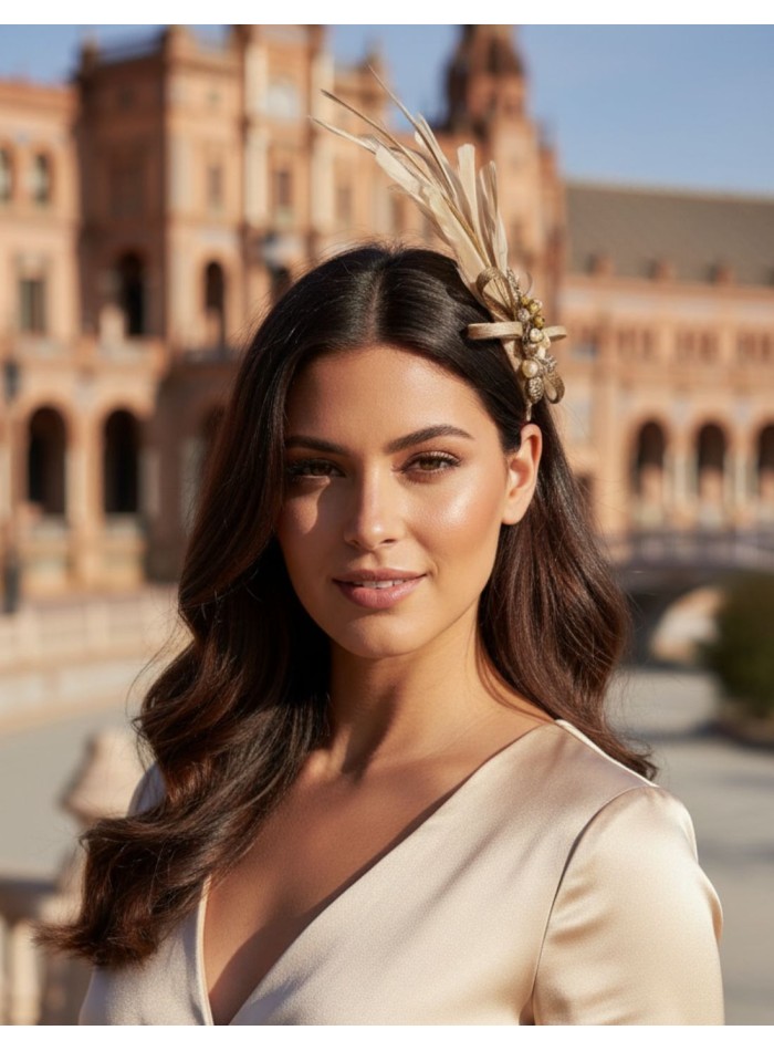 Guest headdress with beige feathers and beige...