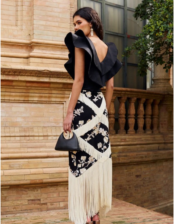 Black top with double ruffle V-neckline for guests 2