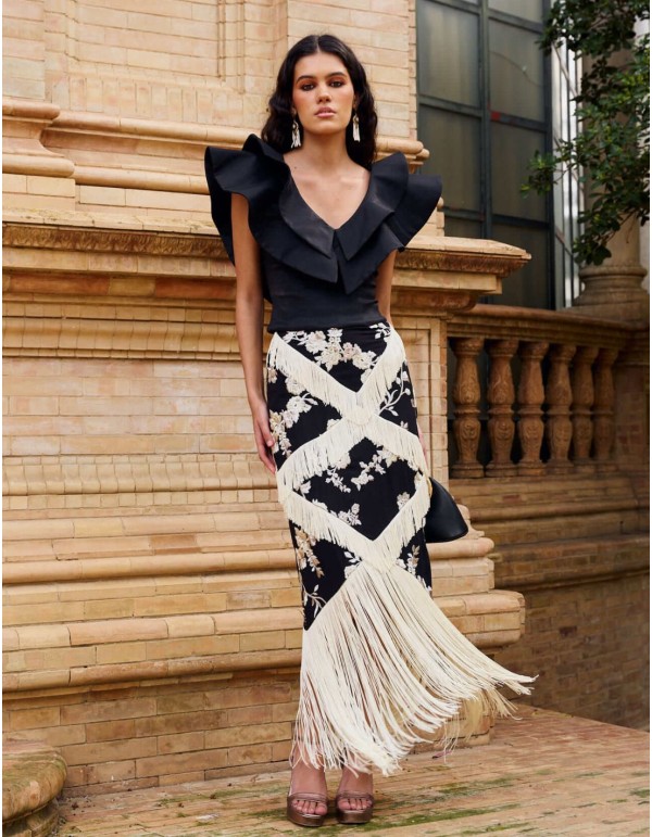 Black midi skirt with floral embroidery and ivory bangs