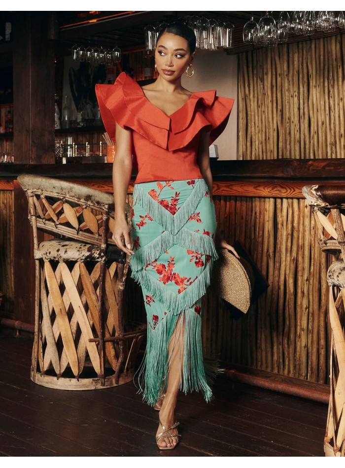 Falda midi en color celeste con flecos y...