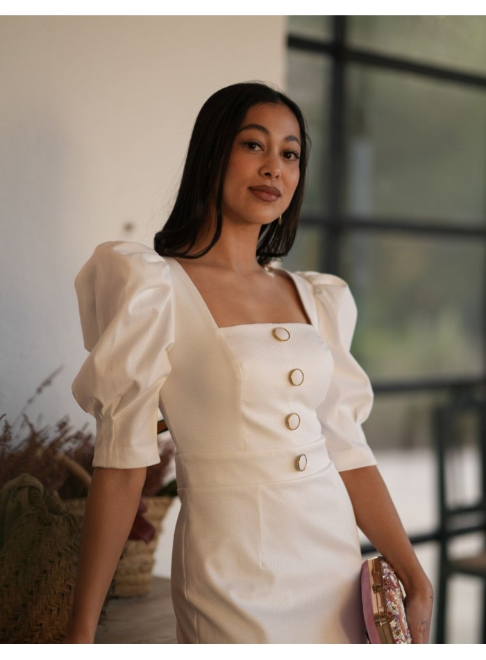 Vestido midi blanco confeccionado en piqué con...