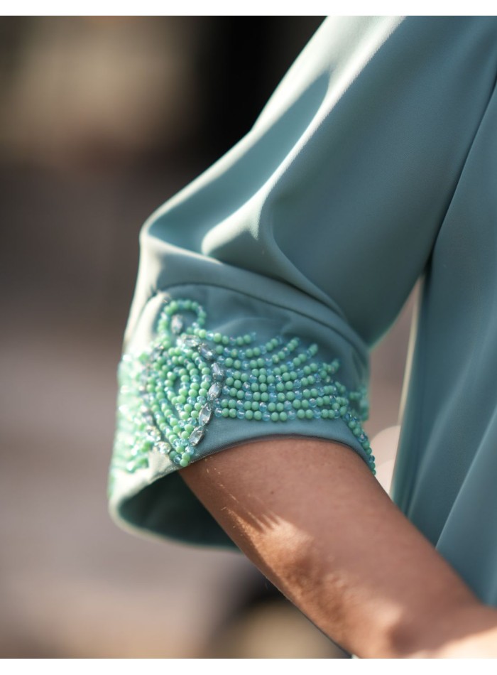 Conjunto de dos piezas de blusa y pantalón en color verde agua