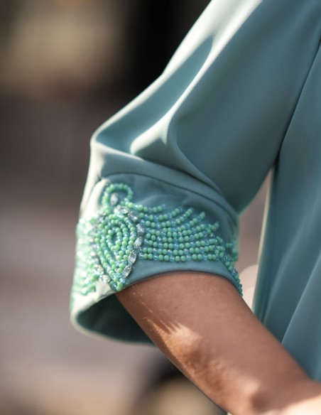 Ensemble deux pièces en vert d'eau avec strass sur les poignets